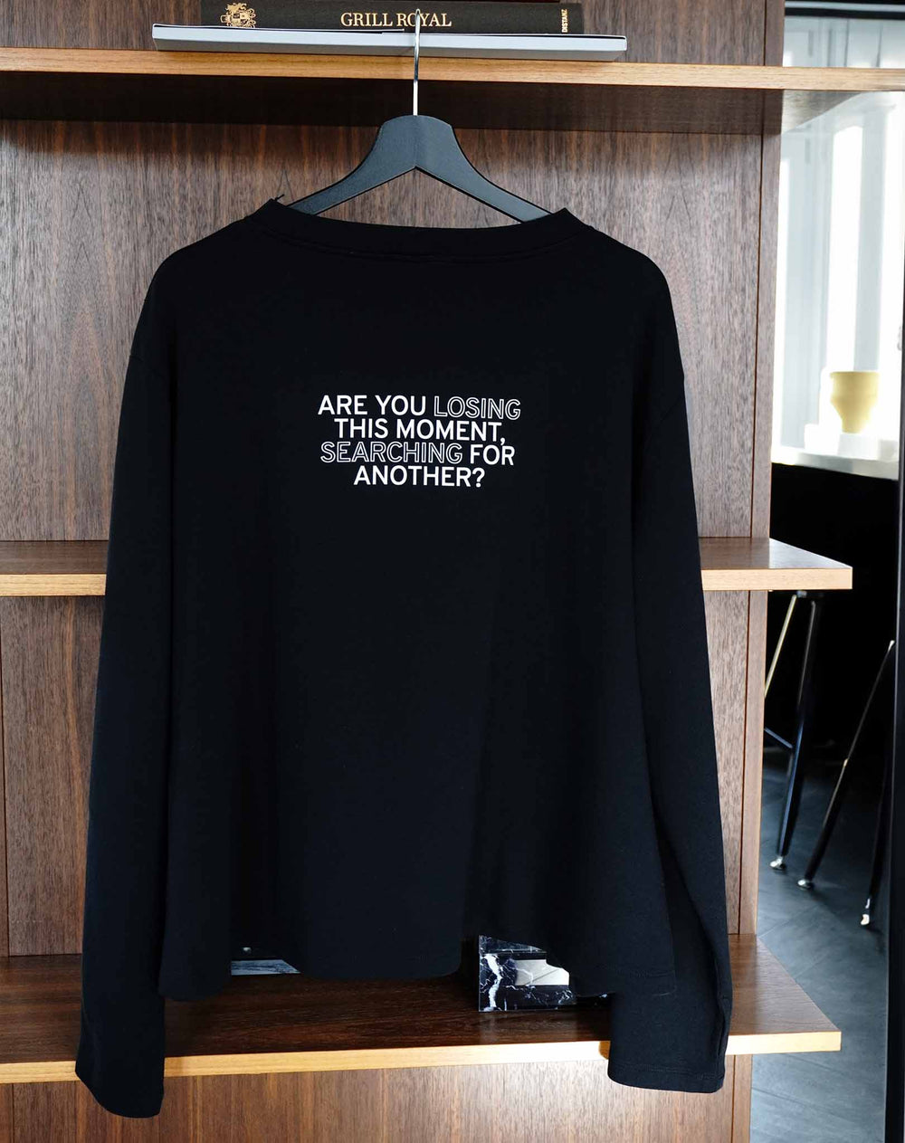 Are you losing this moment searching for another? Black Flowy Long Sleeve